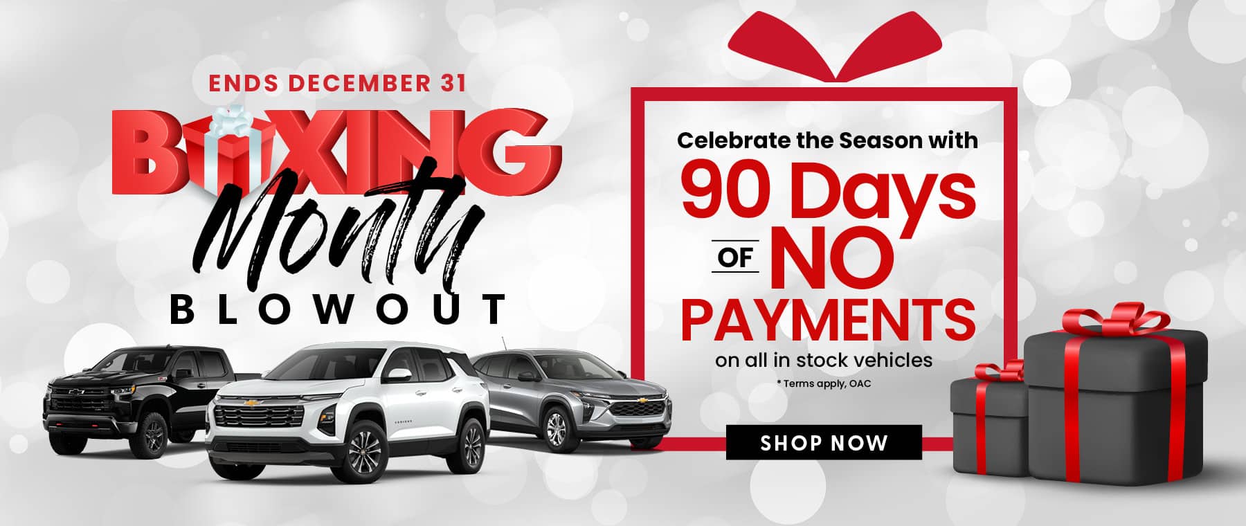Boxing Month car sale with 90 days of no payments through December 31. Features vehicles and gift boxes.