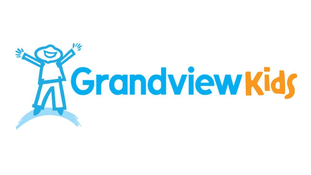Grandview Kids logo with a joyful child illustration, combining blue and orange colors.