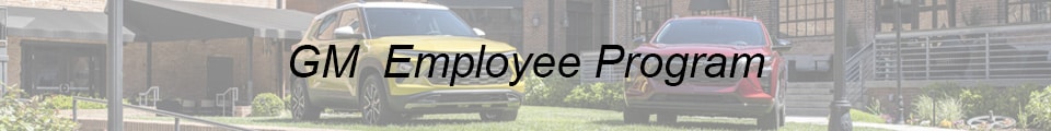 GM Employee Program banner with two cars displayed outdoors for promotional purposes.