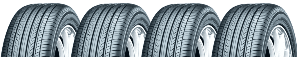 Four high-performance car tires with detailed tread design, ideal for enhanced road grip.