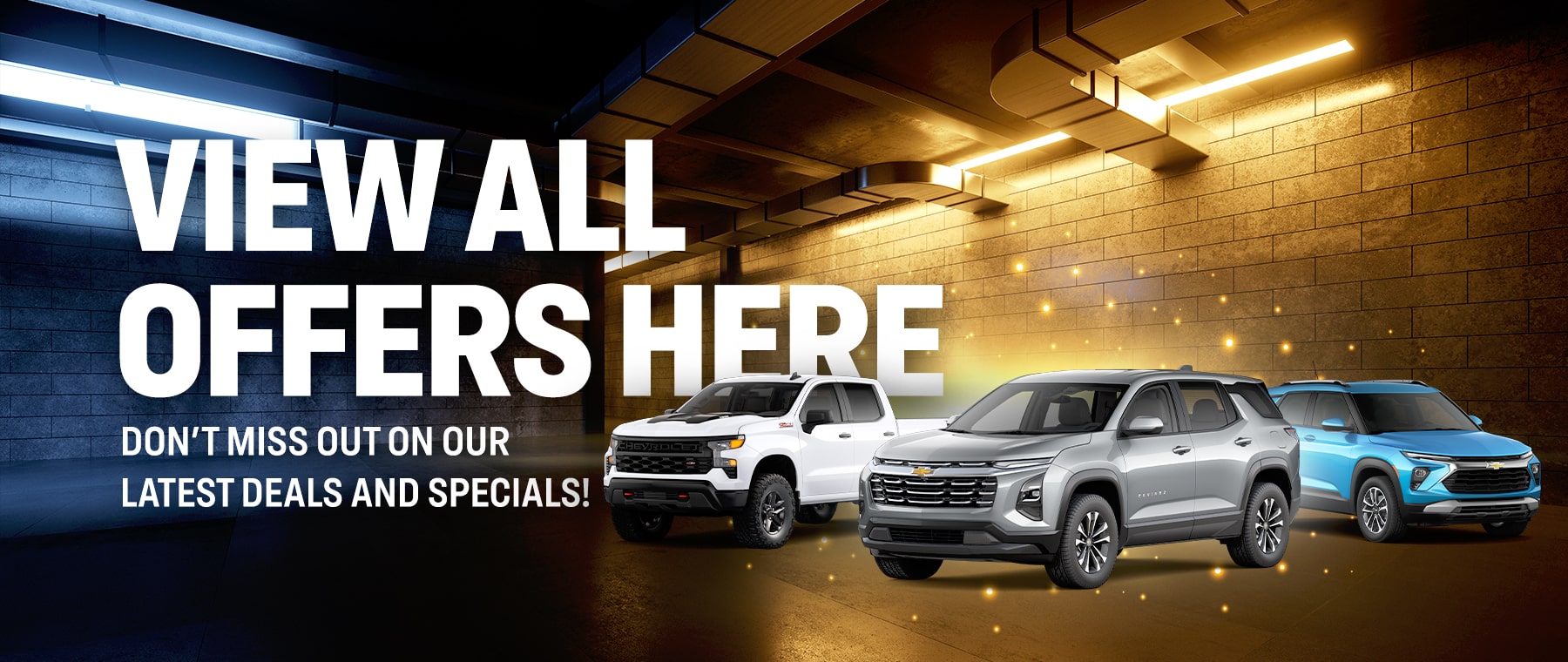 Promotional image featuring "View All Offers Here" text over cars in a lit garage setting.
