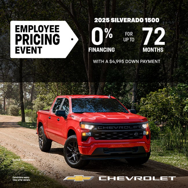 Red 2025 Chevrolet Silverado 1500 on forest road. Employee pricing offers up to $11,300 off MSRP.