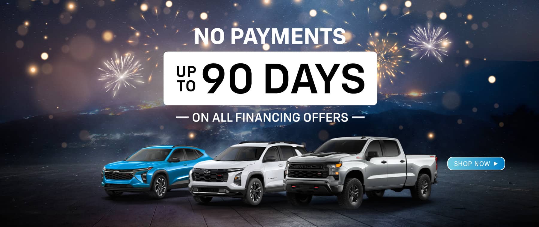 Car financing offer with no payments for 90 days, featuring three Chevrolet vehicles against a fireworks backdrop.
